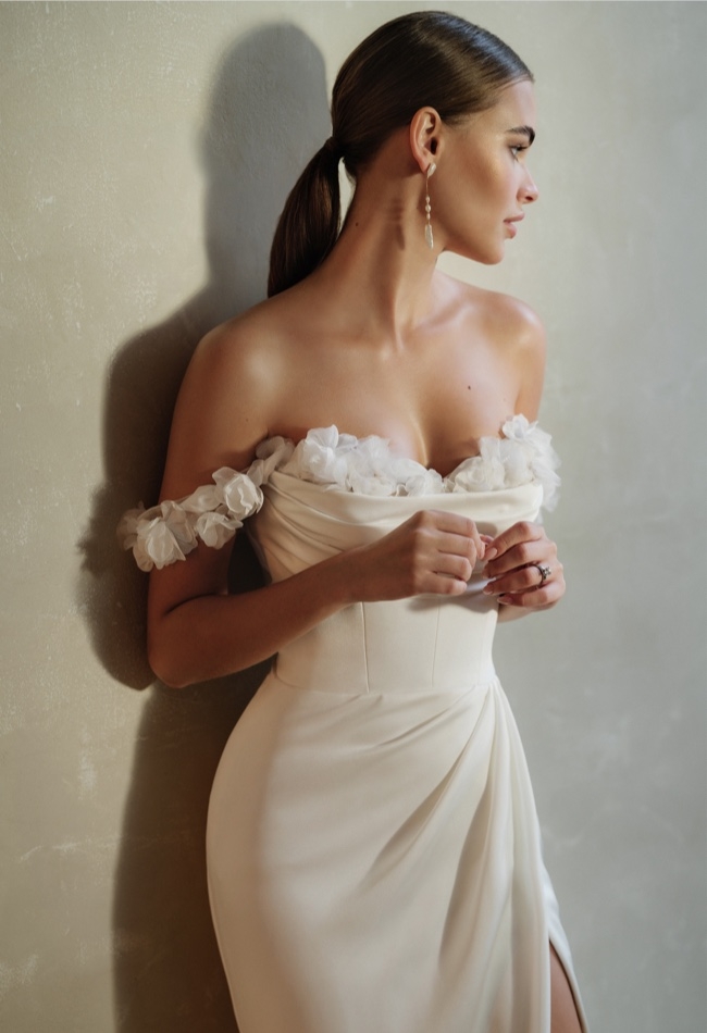 Model wearing a signature gown